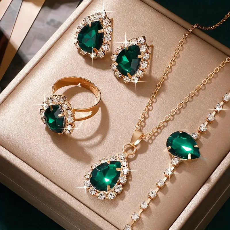Conjunto de joyas Elisandre Vermont en oro de la marca Rose & Oliver, que incluye collar y aretes elegantes y sofisticados.