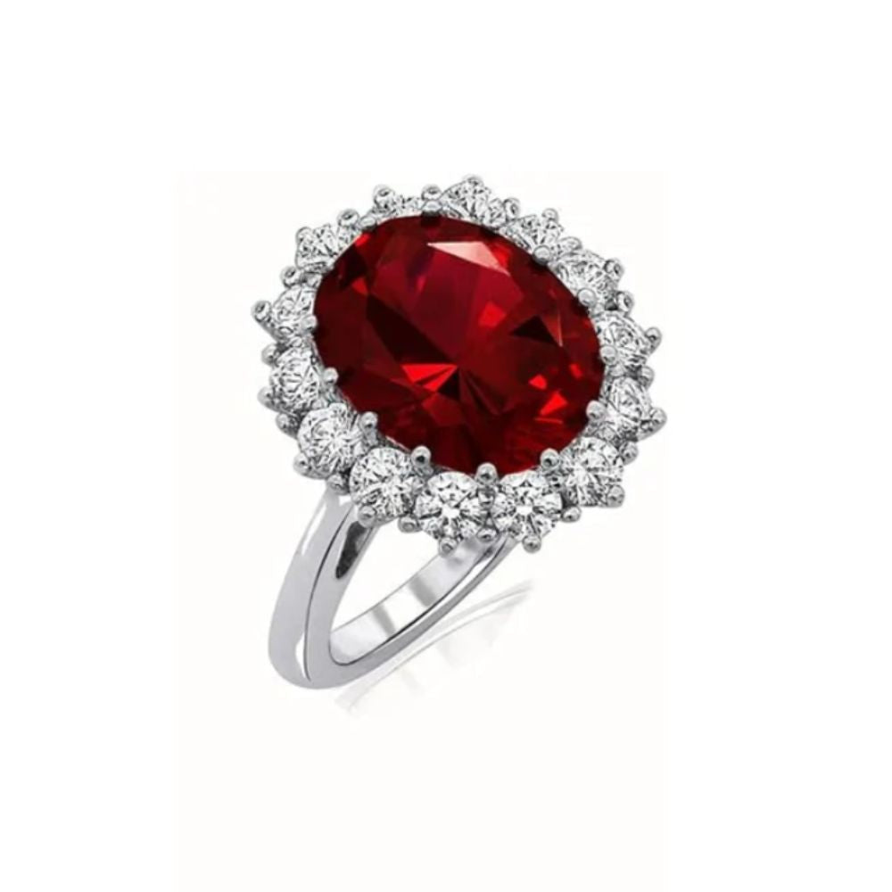 Anillo Corona Escarlata de Rubí, de Rose & Oliver, con resalte en rubí rojo central y acabado elegante en plata.
