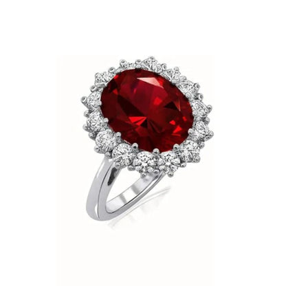 Anillo Corona Escarlata de Rubí, de Rose & Oliver, con resalte en rubí rojo central y acabado elegante en plata.