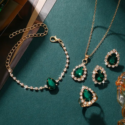 Conjunto de joyas Elisandre Vermont de Rose & Oliver con detalles en oro, incluyendo collar y aretes elegantes.