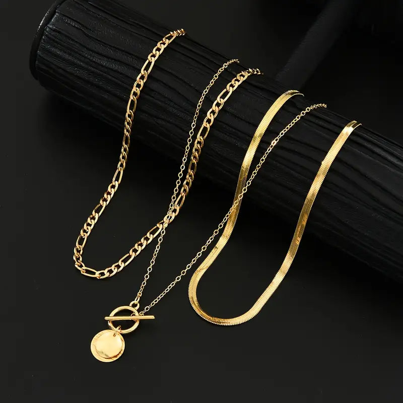 Collar en capas con textura de monedas doradas de Rose & Oliver, estilo elegante y sofisticado, con acabamento dorado brillante.