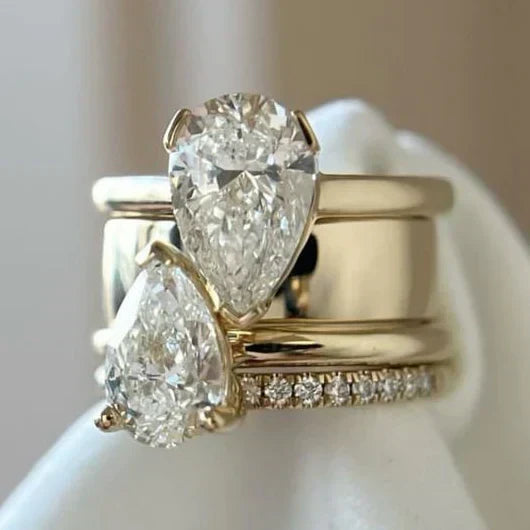 Anillo vintage Rose & Oliver con doble gota de circonita, detalles elegantes y acabado clásico en plata.