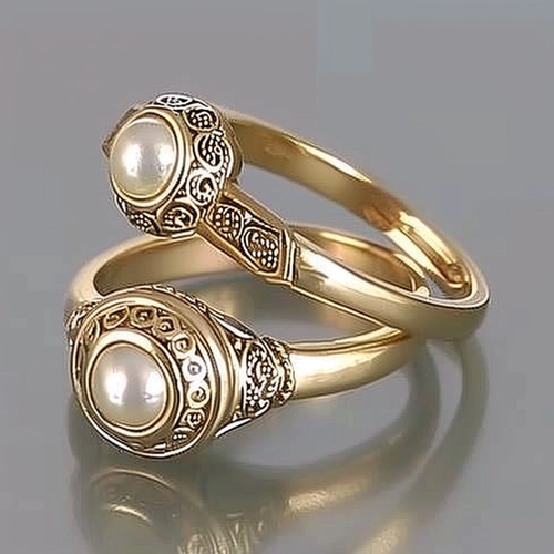 Set de joyas vintage con anillos de perlas con incrustación en oro, de la marca Rose & Oliver, mostrando detalles elegantes y tradicionales