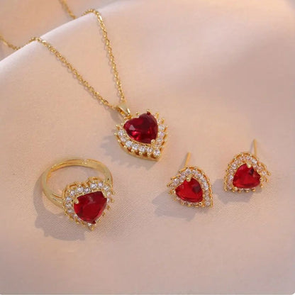 Conjunto de joyas Anavelle Roubella con anillo y aretes de rosa y oro, que muestra detalles elegantes y acabado refinado.